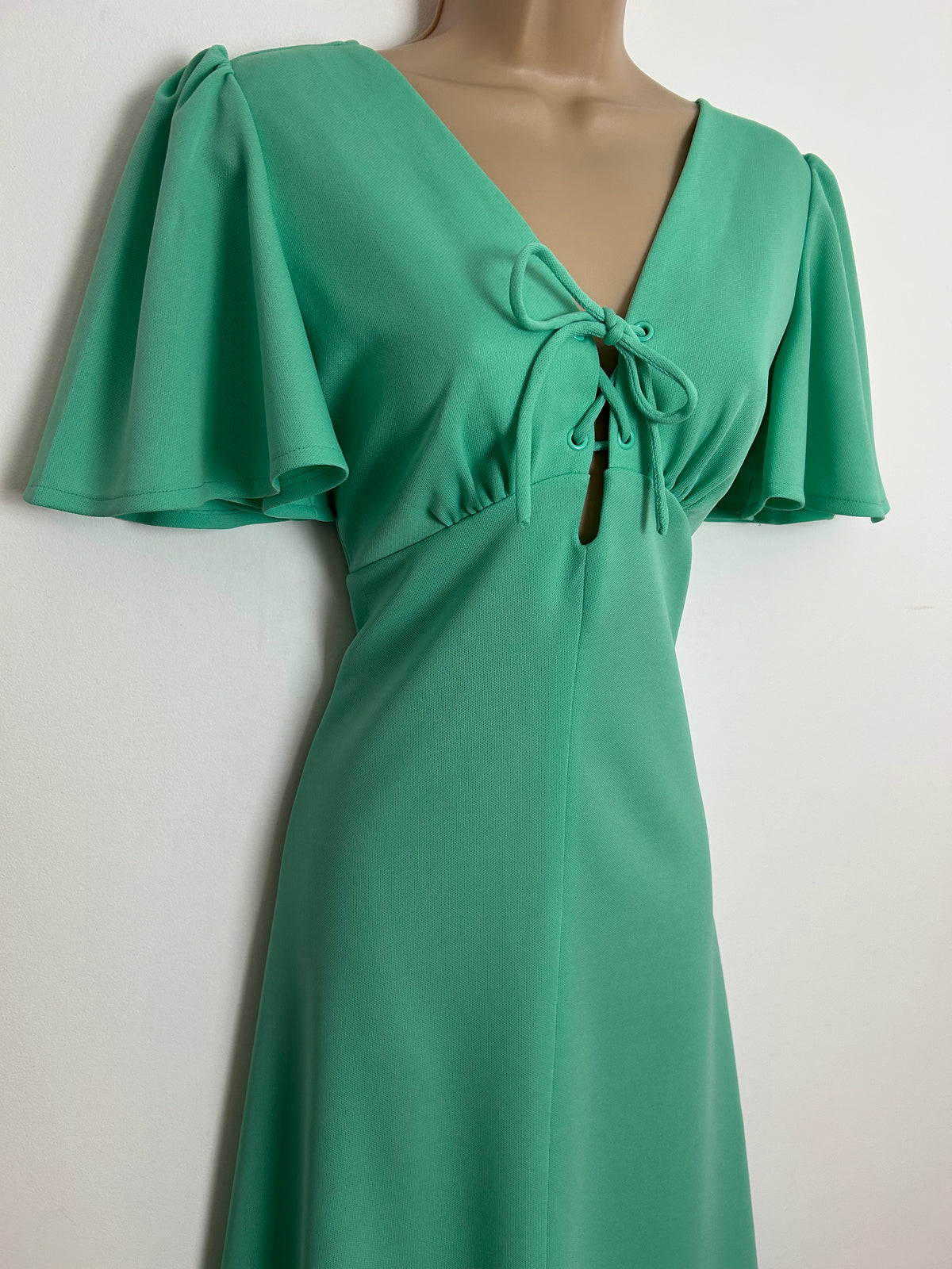 Vintage 1970s Size 8 Mint Green lace Up Bodice Flutter Sleeve Fit & Flare Dress