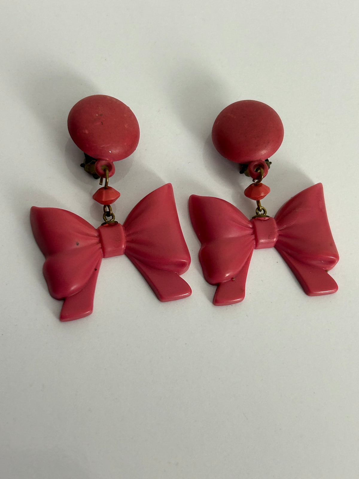 Vintage 1950s Cute Pink Plastic Dangle Bow Clip On Earrings