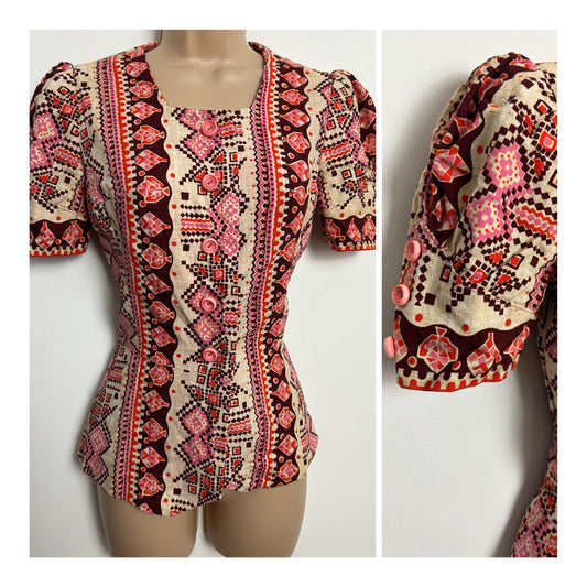Vintage Late 1960s Size 6-8 Beige Pink Orange & Dark Red Abstract Print Peplum Short Sleeve Top